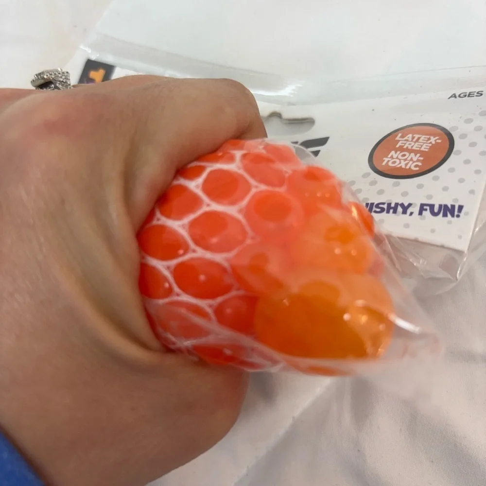 NWT Color Changing Ooze Ball Sensory Fidget Toy- Toy Planet orange